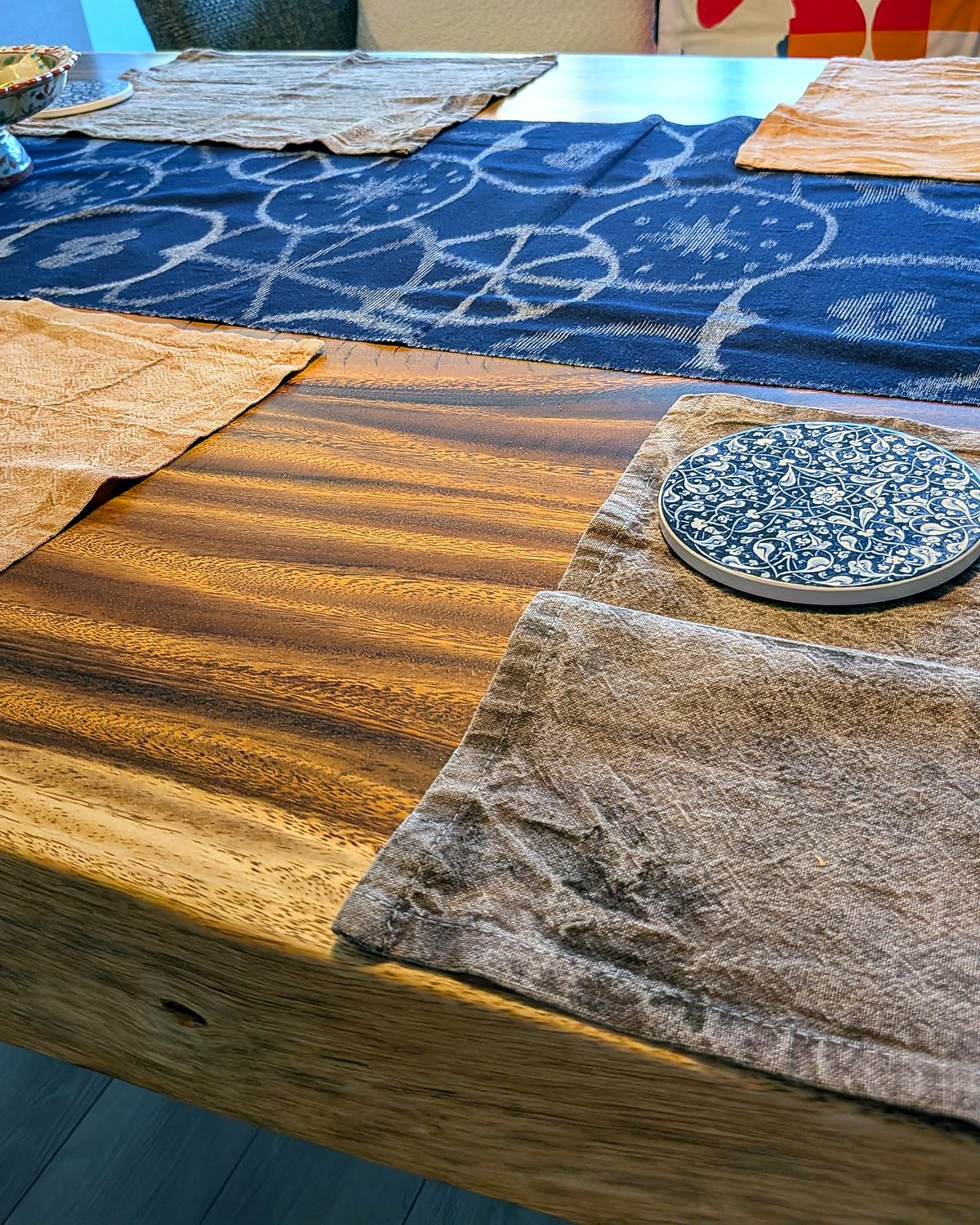 Kakishibu-dyed cloths laid on a wooden table